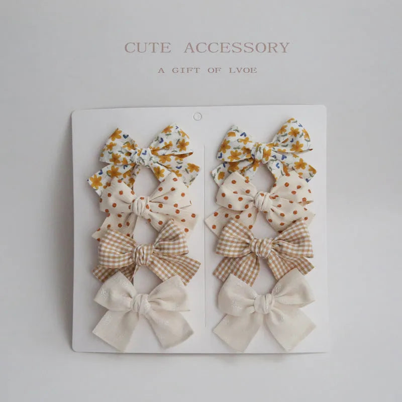 Children's fabric bow hair clips in dovetail shape with eight colour set options