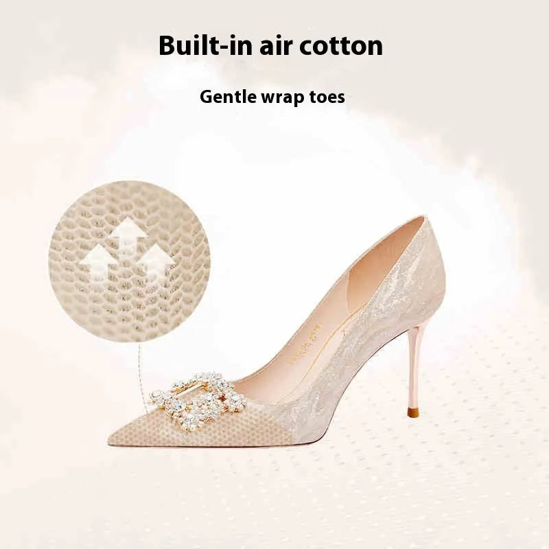 Champagne gold women's high heels with pointed toe and stiletto heel on white background