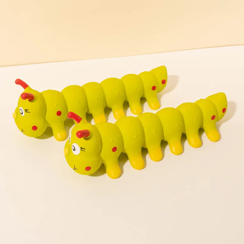 Yellow caterpillar-shaped dog rubber squeaky toy measuring 25.5cm long