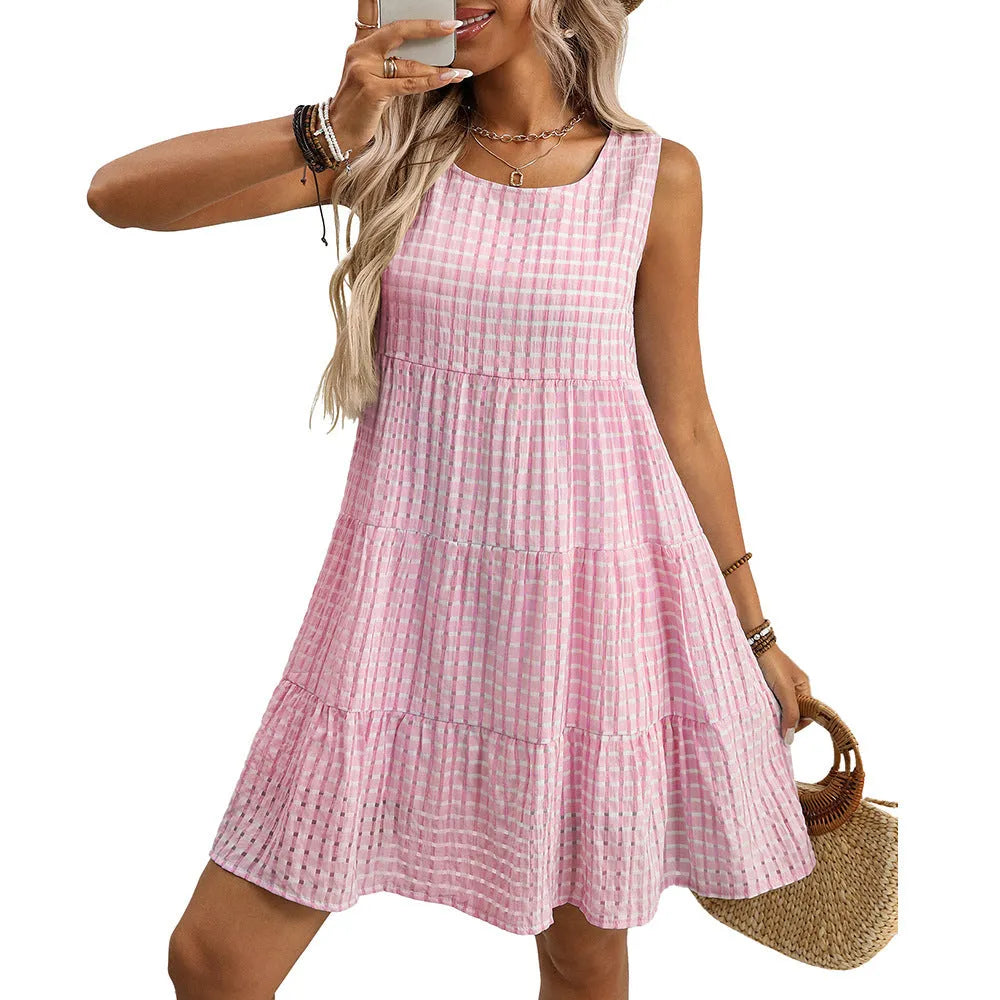 Women's loose sleeveless plaid dress with an oversized swing skirt and high waist.