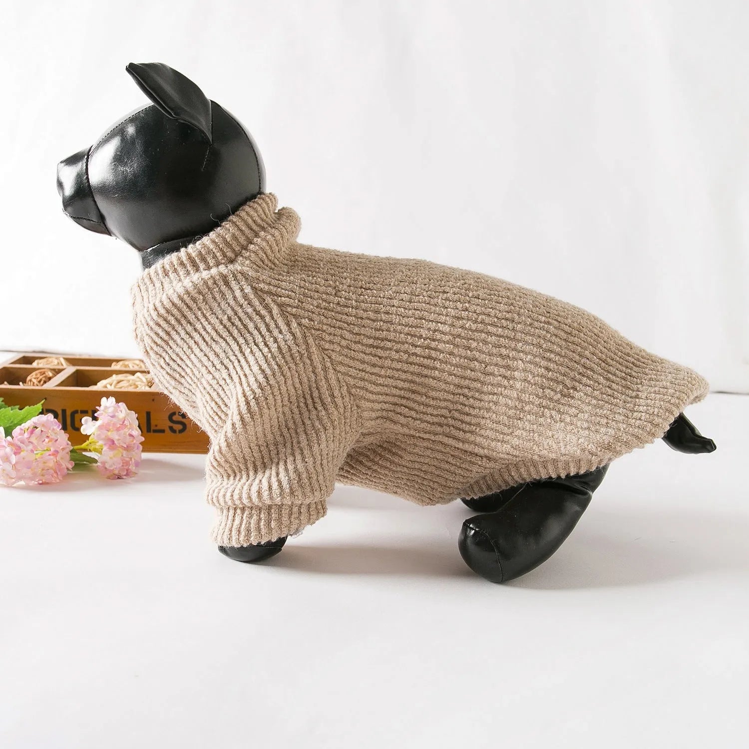 Brown cloth pullover sweater on a small dog, showing casual style and fit.