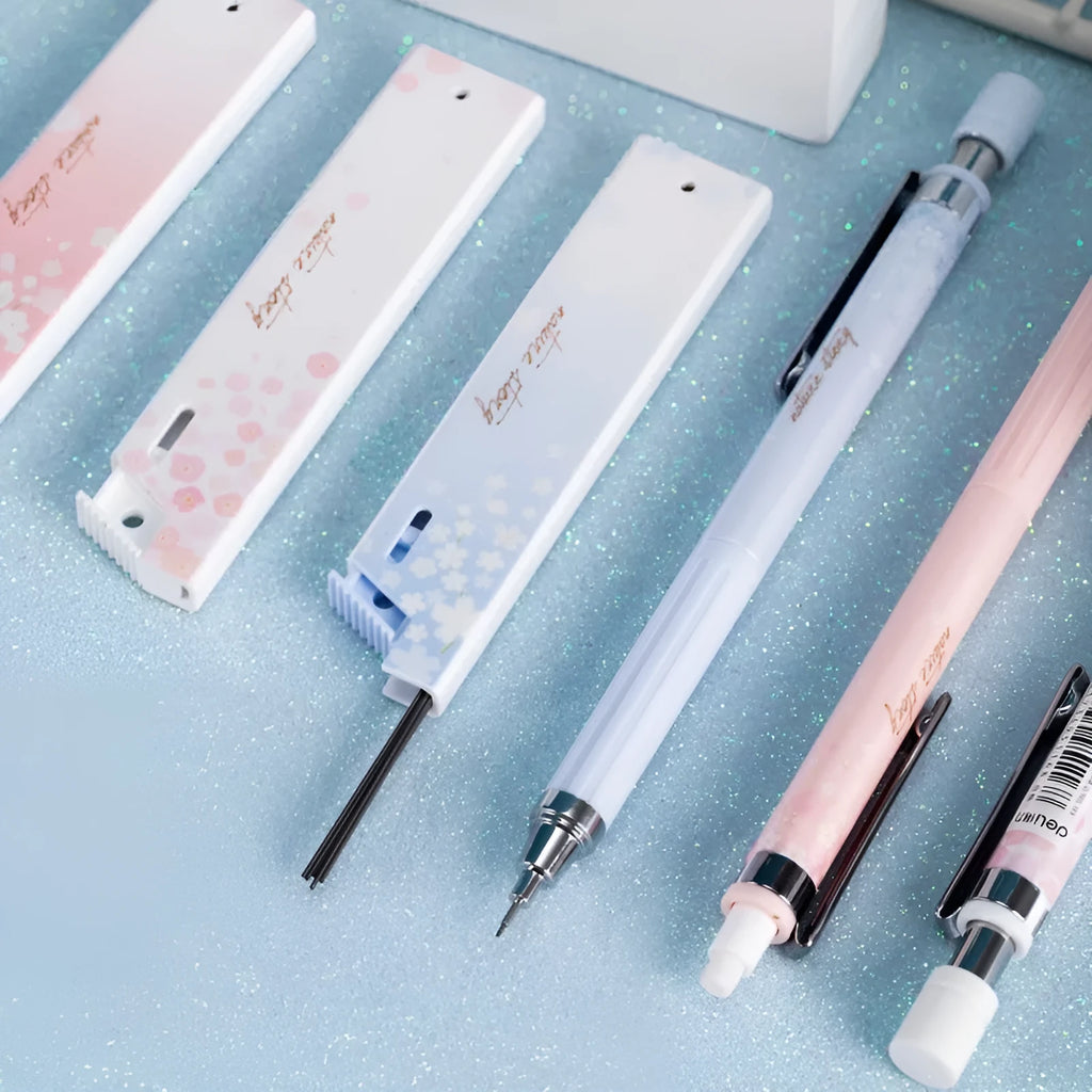 Mixed colour cartoon style 0.5mm automatic pencil set with three pencils and three boxes of HB refills.