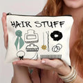 Polyester canvas cosmetic bag with a metal zip closure, shown in one of five available colours.