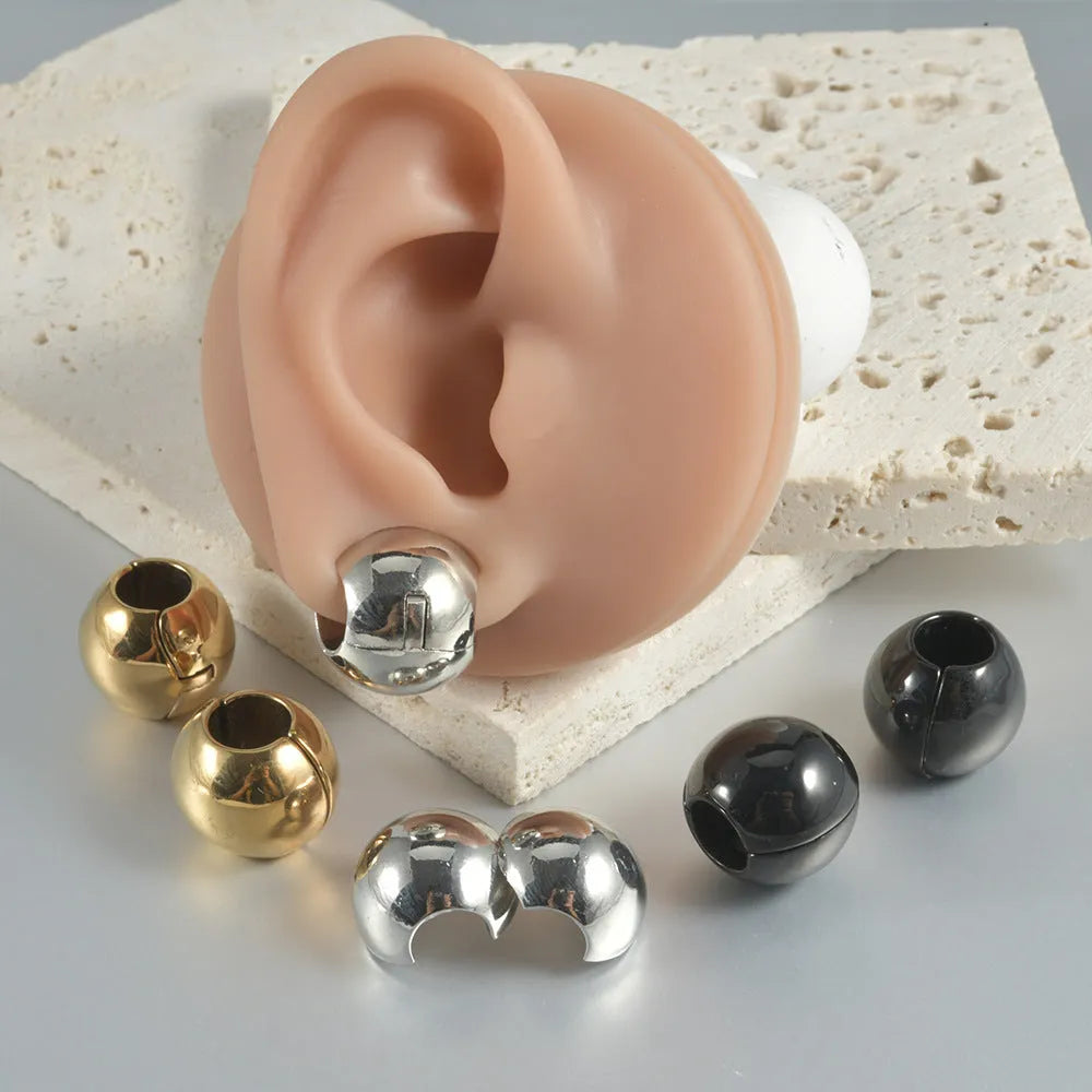 Stainless steel hollow skull Buddha earrings in geometric hip hop design with electroplated finish