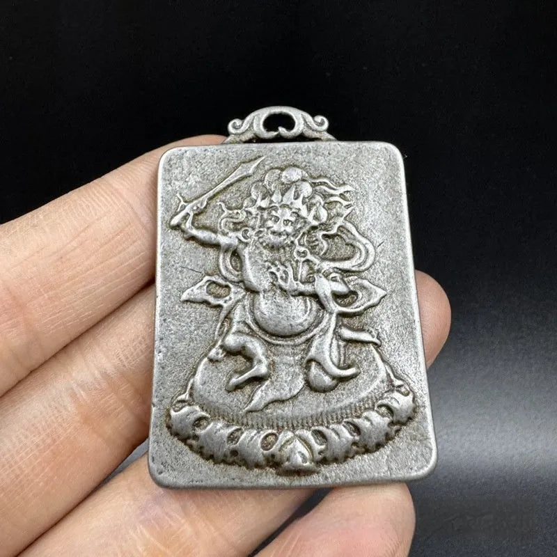 Iron metal hanging pendant with Chinese-style Aryaacalanatha Yamantaka geometry design.