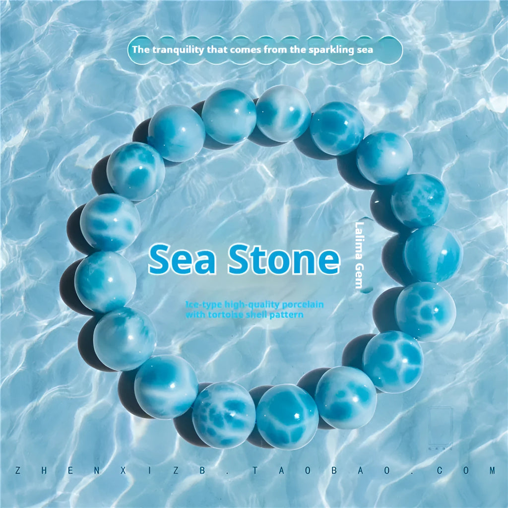 Blue hand-crafted bodhi bracelet with a pearl accent, showing bead sizing options.