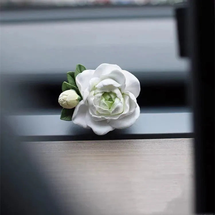 Jasmine car perfume solid gypsum diffuser measuring 5 by 4.5 centimetres with essential oil bottle