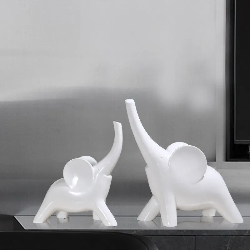 Modern minimalist resin elephant ornament in rose gold or white colour, available in large and small sizes.