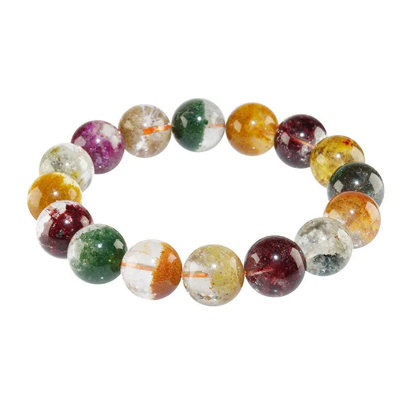 Colourful ghost cornucopia crystal bracelet with 10mm beads on a wrist.