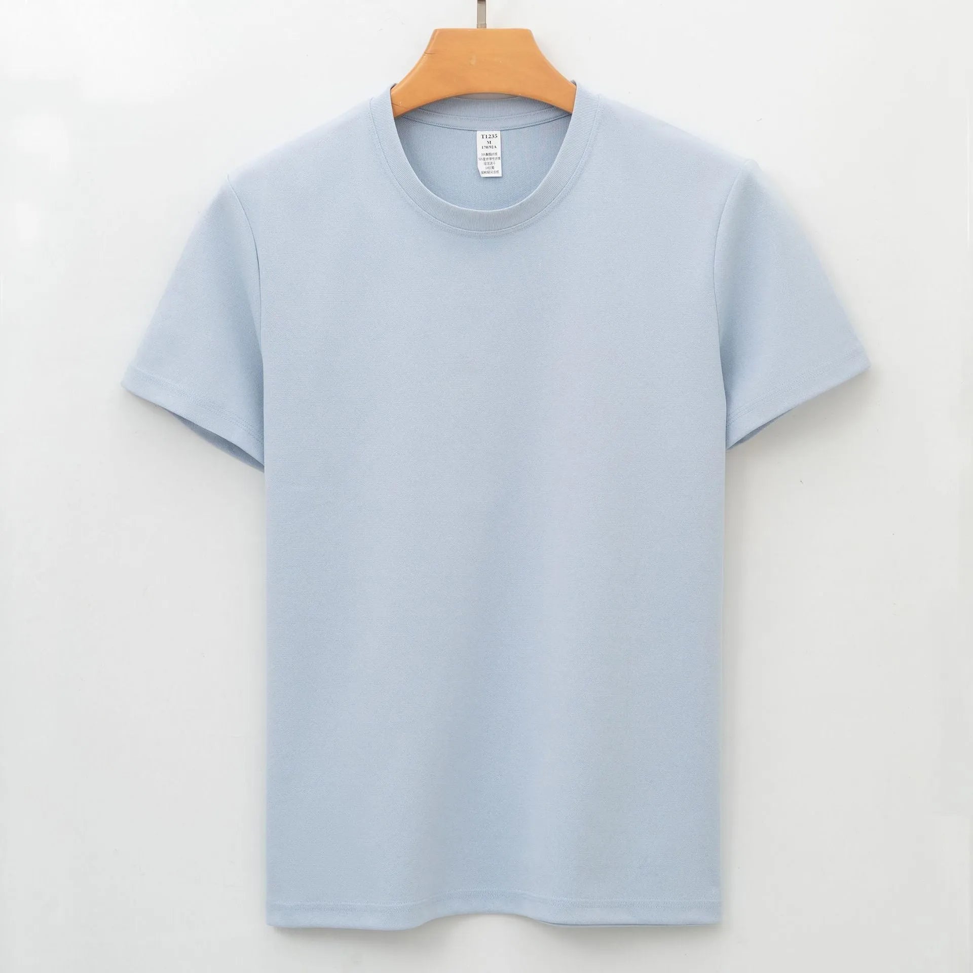 Men's solid colour antibacterial quick-dry short sleeve t-shirt on a hanger, straight cut style.