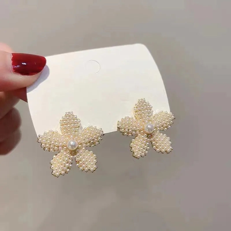 Women's gold Korean style alloy earrings with pineapple and starfish charms inlaid with artificial gems.