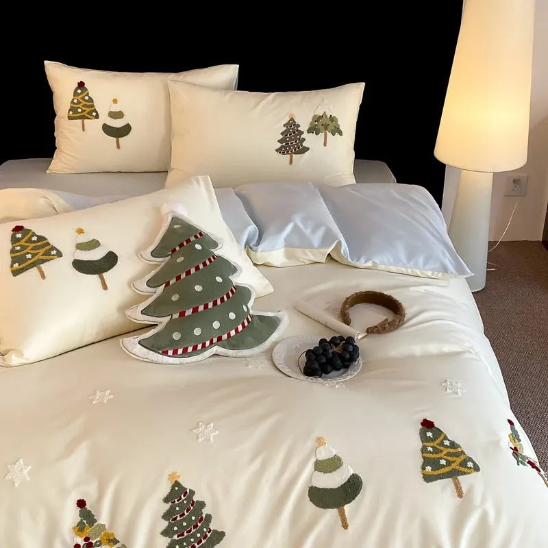 Cream blue duvet cover with embroidered Christmas tree and towel motif, part of a 100% cotton four-piece bedding set.