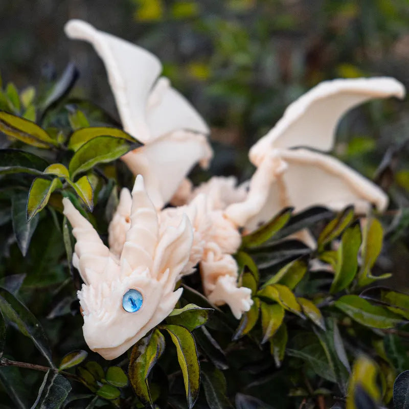 Red and gold PLA flying dragon wings decoration toy measuring 25cm wide.