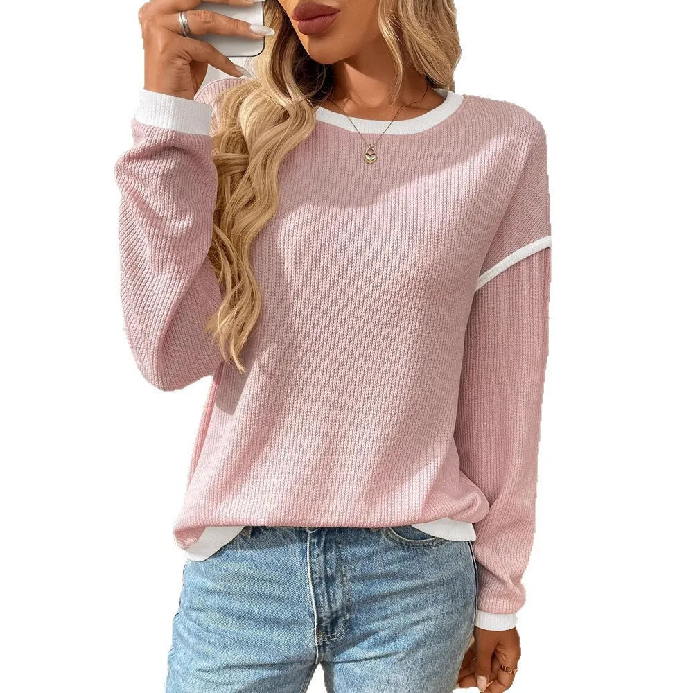 Women's loose pullover top in round neck design with long sleeves available in multiple colours