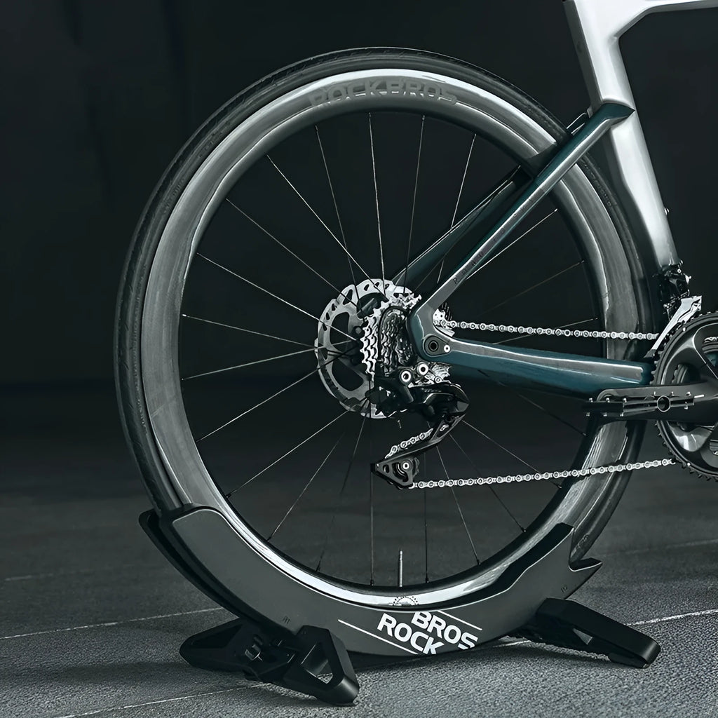 Black and green bicycle wall mount parking rack for mountain and road bikes