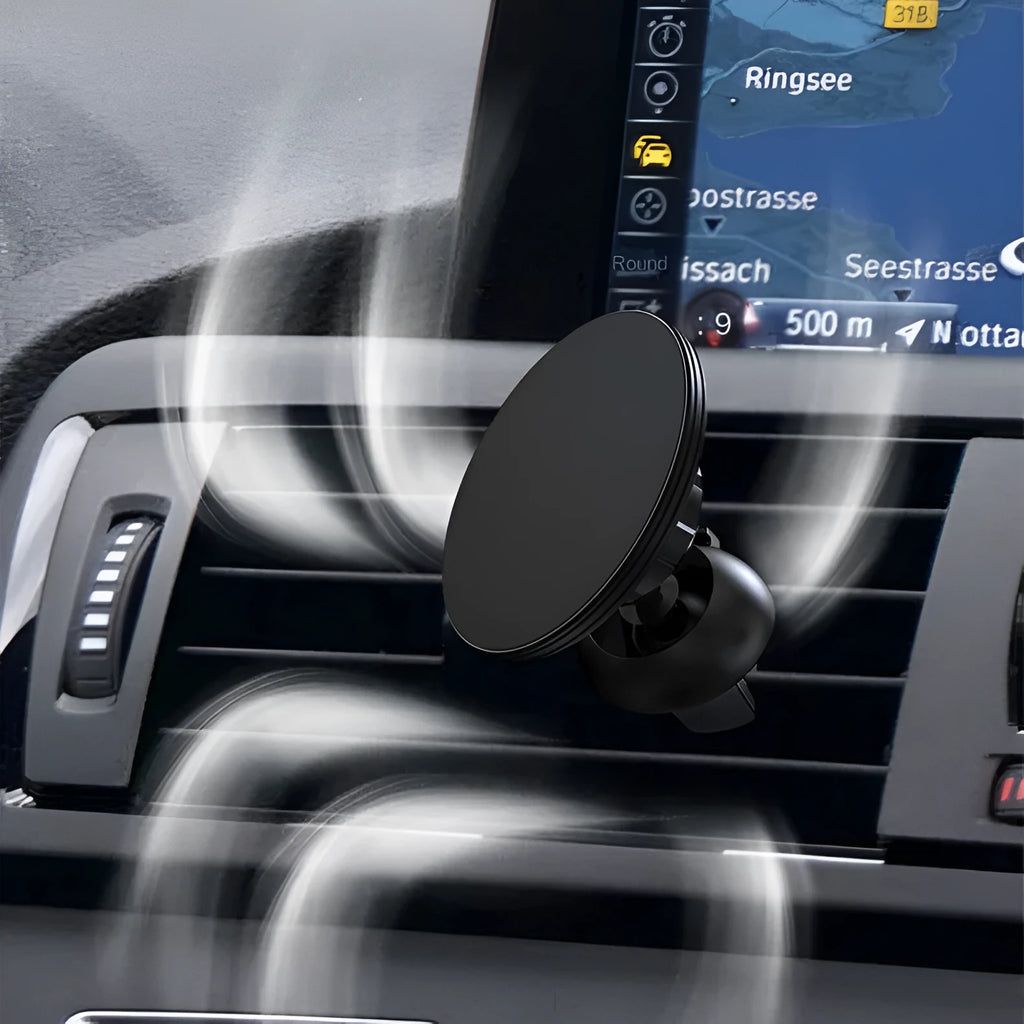 Black aluminium alloy magnetic phone holder attached to a car air vent.