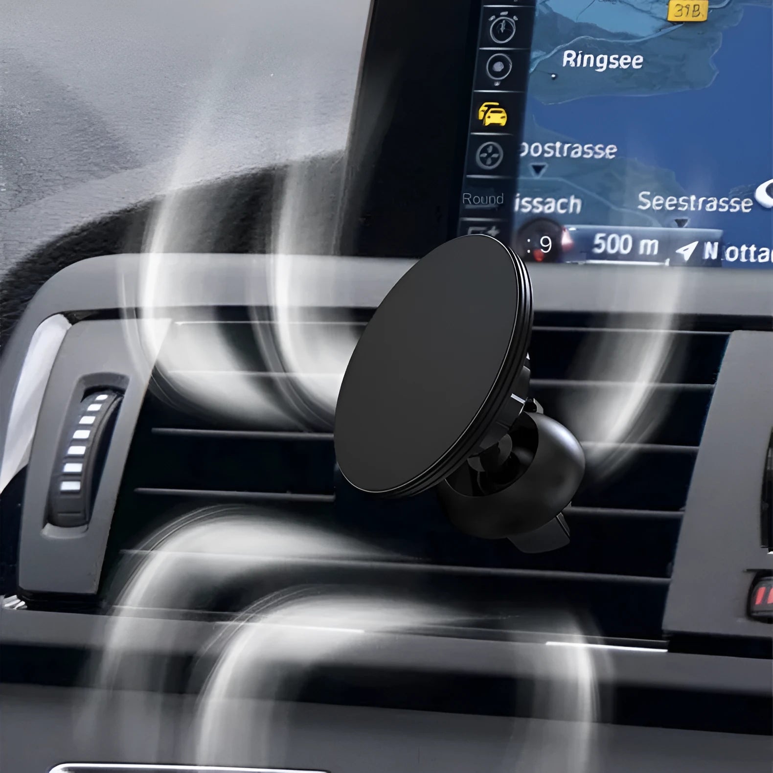 Black aluminium alloy magnetic phone holder attached to a car air vent.