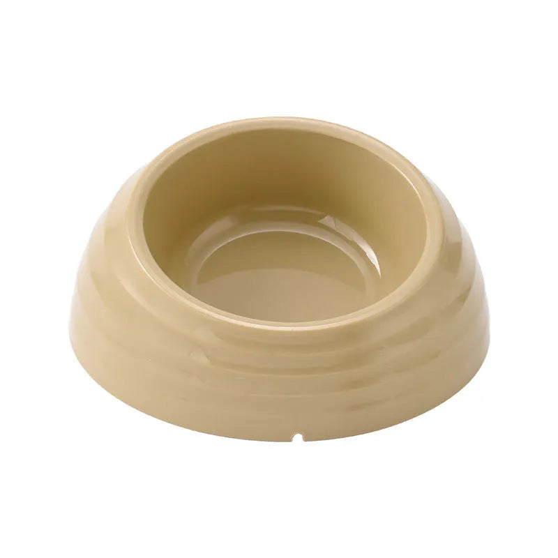 Stainless steel cat bowl with plastic non-slip base in a choice of beige, brown, or light green colours.