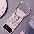 Ultra thin faux leather folding phone case for Samsung Galaxy Z Flip with white silver border, flower bow and bracelet
