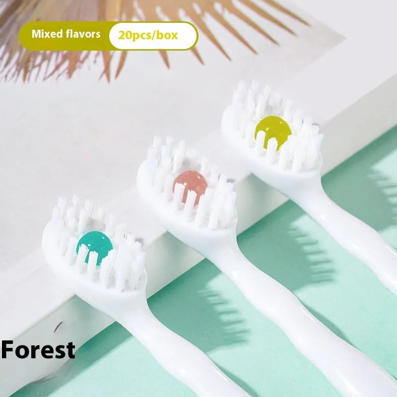 Box of 20 disposable bead toothbrushes in compact packaging for travel hygiene.