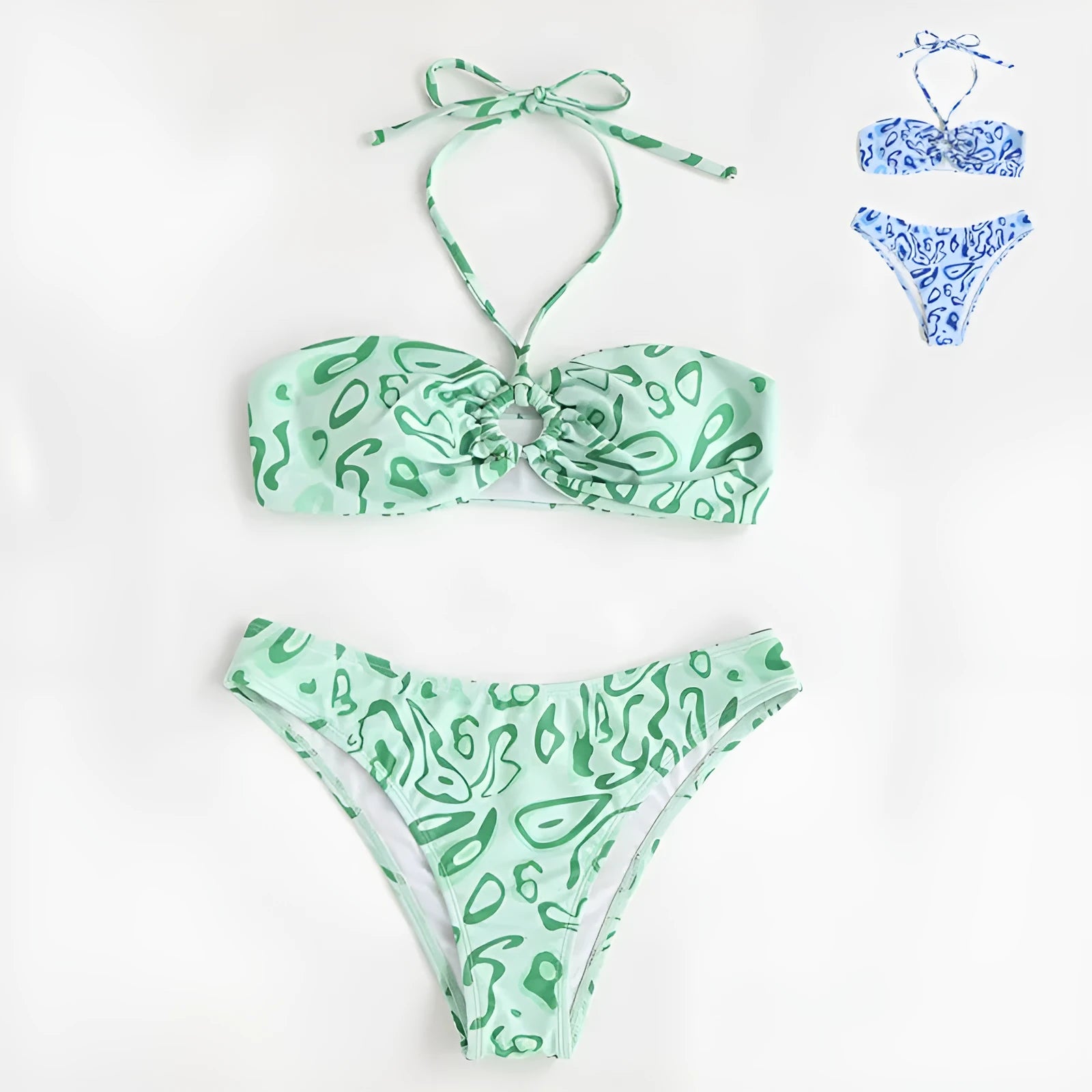 Green floral bandeau bikini swimsuit with split design and adjustable straps on mannequin