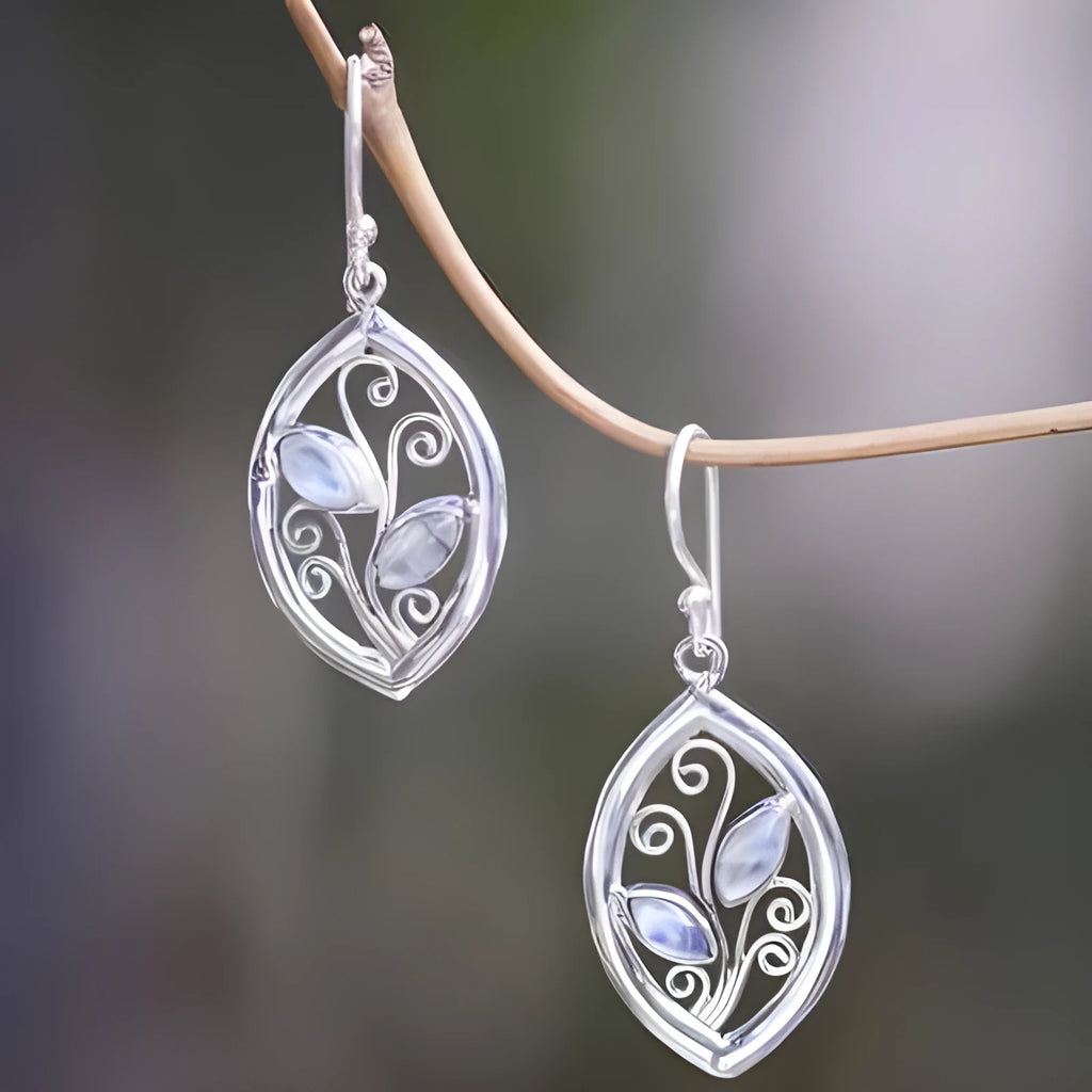 Silver leaf-shaped drop earrings with colourful moonstone centrepieces for women