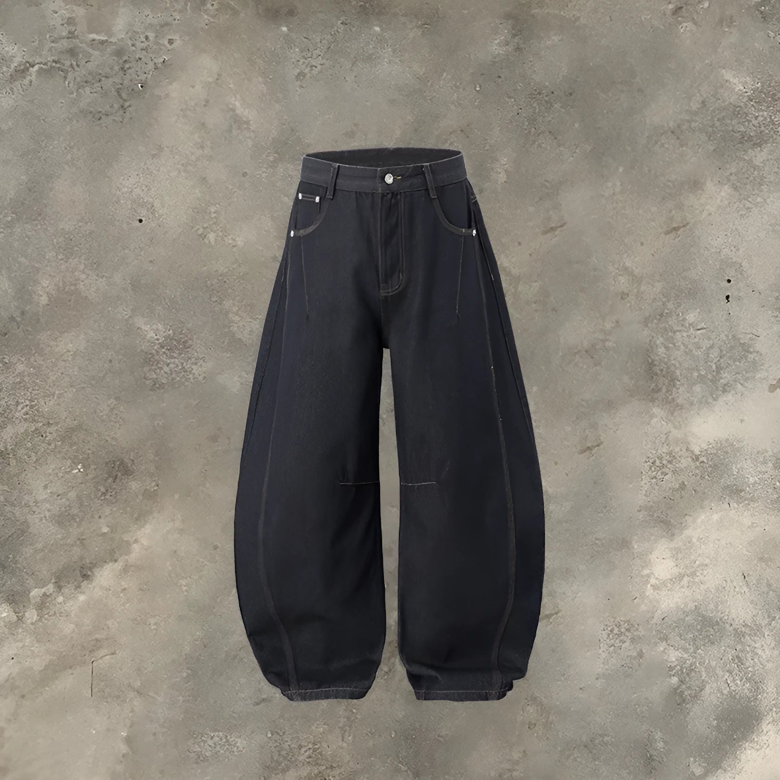 Men's original cow colour wide leg denim trousers laid flat.