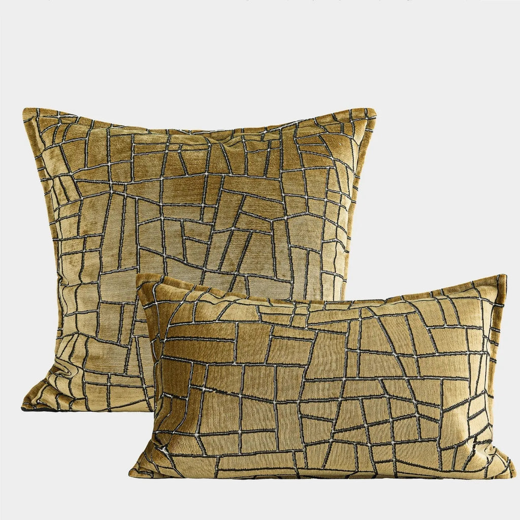 Tuhao gold geometric abstract pattern on square and lumbar cushion covers.