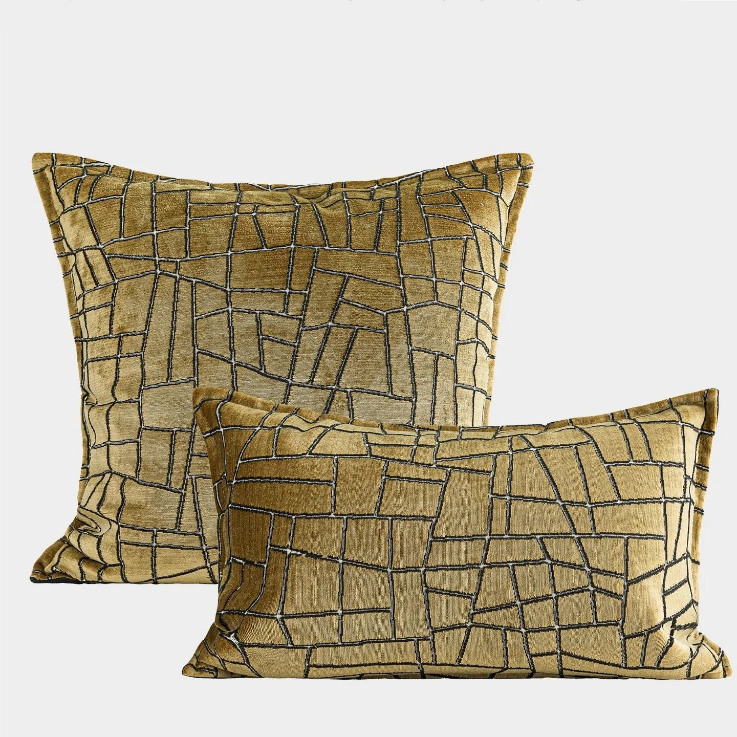 Tuhao gold geometric abstract pattern on square and lumbar cushion covers.