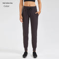 Women's high waist yoga pants with drawstring in Distilled Coffee colour.