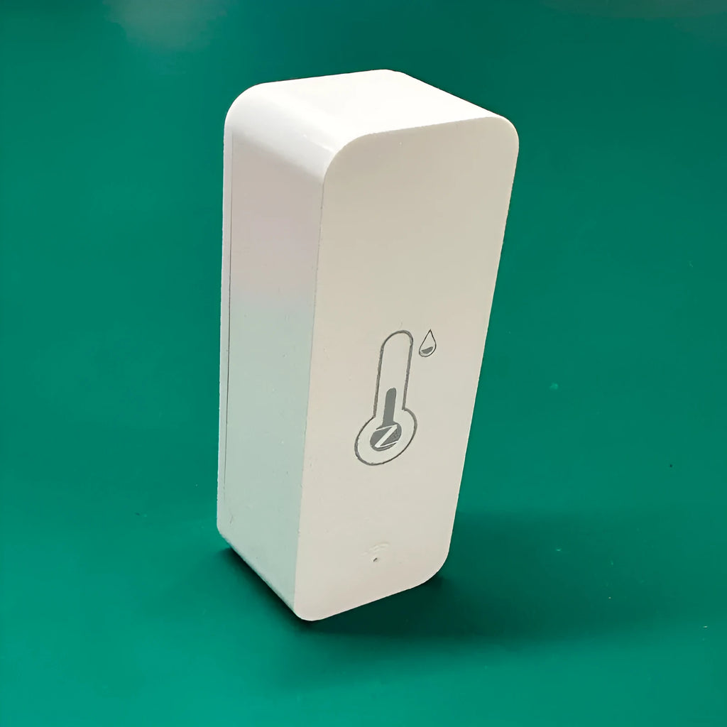 WiFi and Zigbee temperature humidity sensor in ABS plastic case measuring 72mm