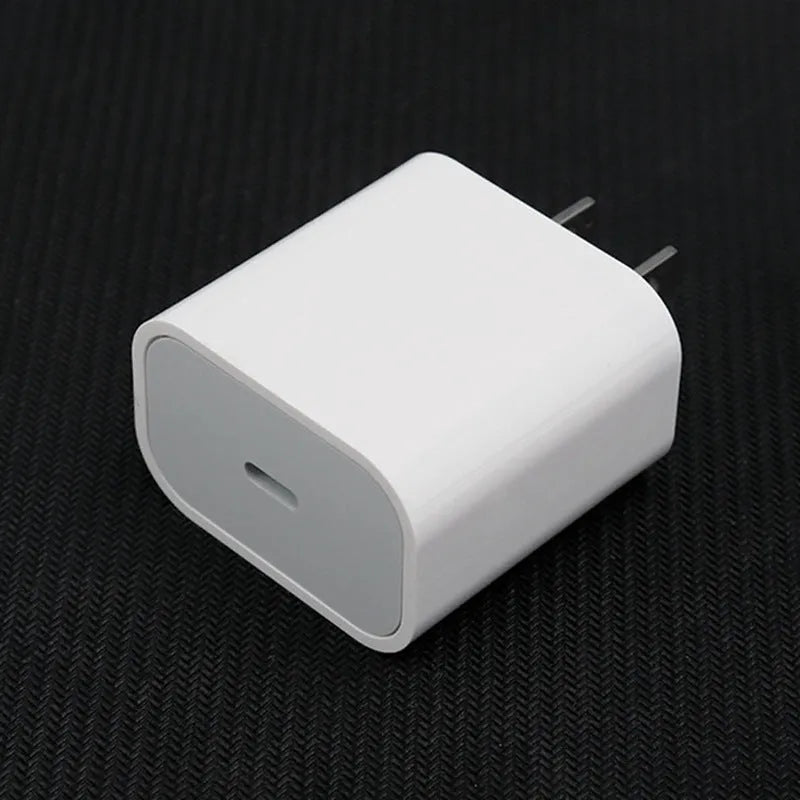 White 20W USB Power Delivery mobile phone charger with EU plug and USB port.