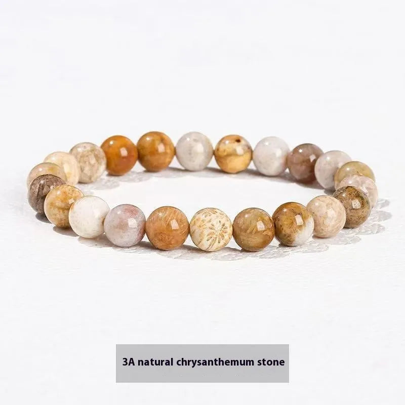Natural tigereye crystal bracelet with yellow tiger eye beads approximately 8mm diameter on elastic cord