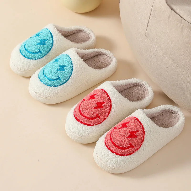 Women's plush home slipper with cartoon graphic print and non-slip PVC sole.