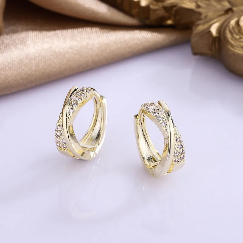 Geometric drop earrings with zircon stones and 14K yellow gold plating on copper
