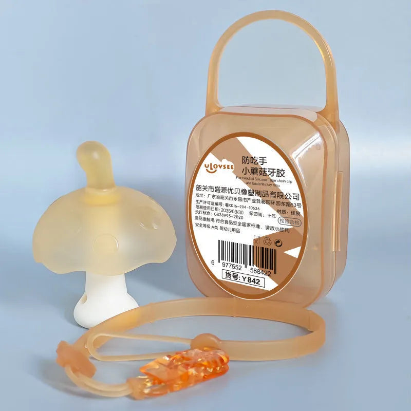 Small pink mushroom-shaped latex gum inside a transparent plastic box with a thin silver chain.