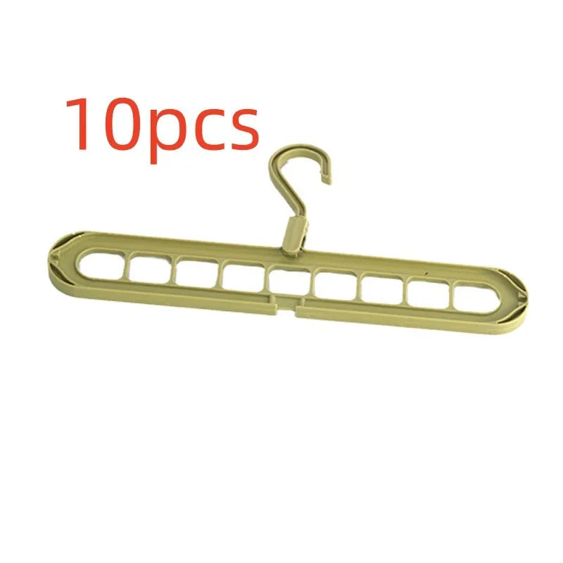Multifunctional plastic hanger with nine holes for folding trousers, shown in beige