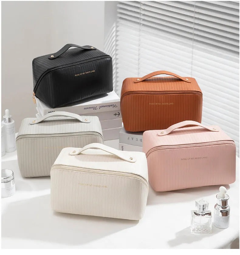 Vertical pattern pillow makeup bag in cubic shape with PU material, shown in available colours.