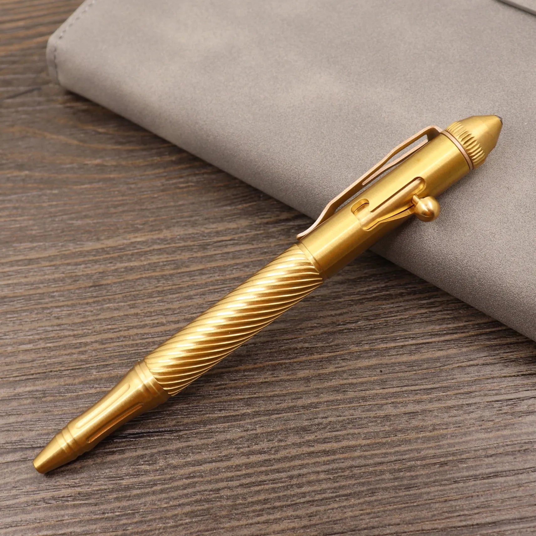 Brass tactical pen with retro colour finish and press mechanism