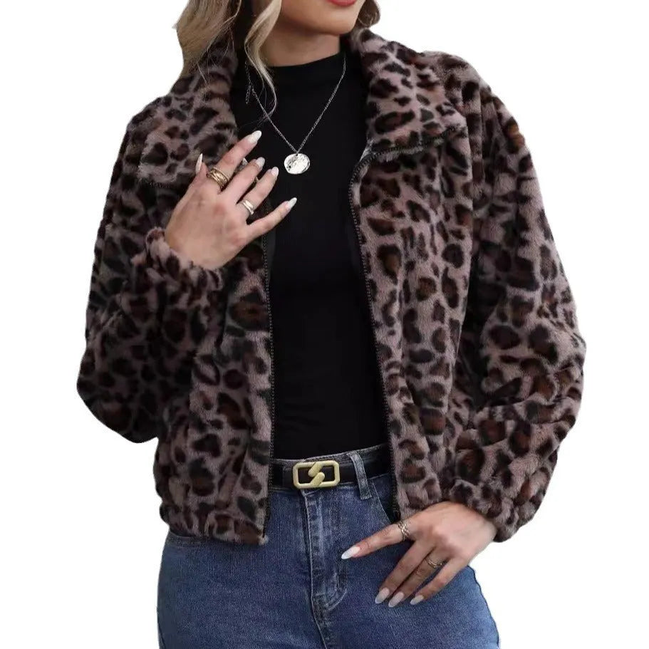 Women's loose fit leopard print plush coat with front zip and long sleeves.