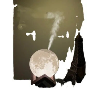 Wood finish Lunar humidifier night light with spherical design on a table.