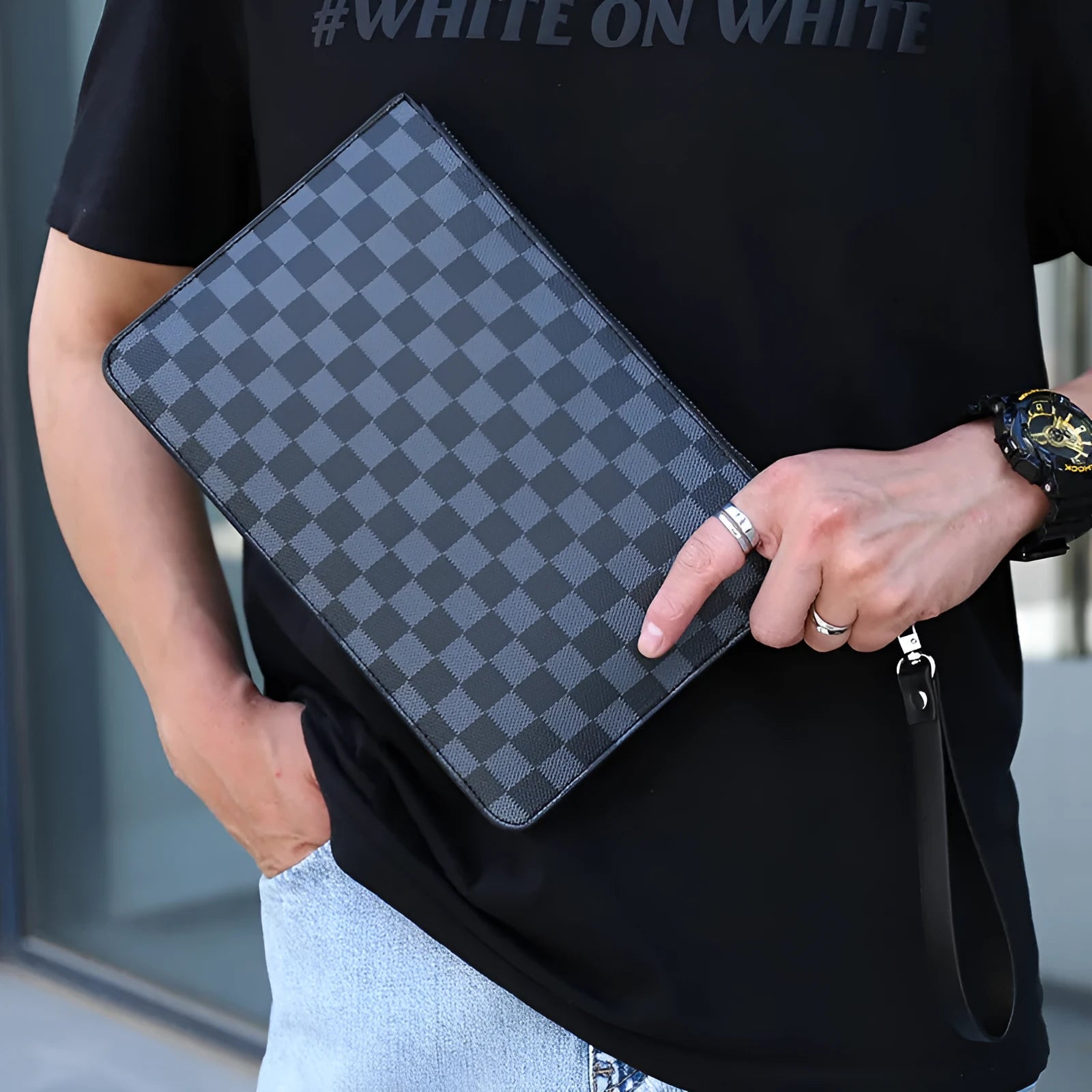 Men's black checkered PU leather clutch wallet open to show six card slots and a zipper pocket.