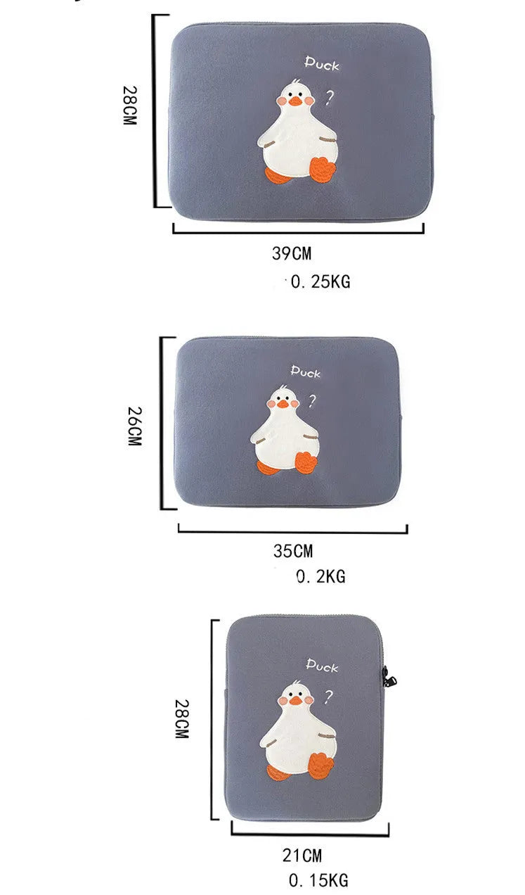 Blue cotton tablet case with a cartoon duck embroidery design and a silver zipper closure.