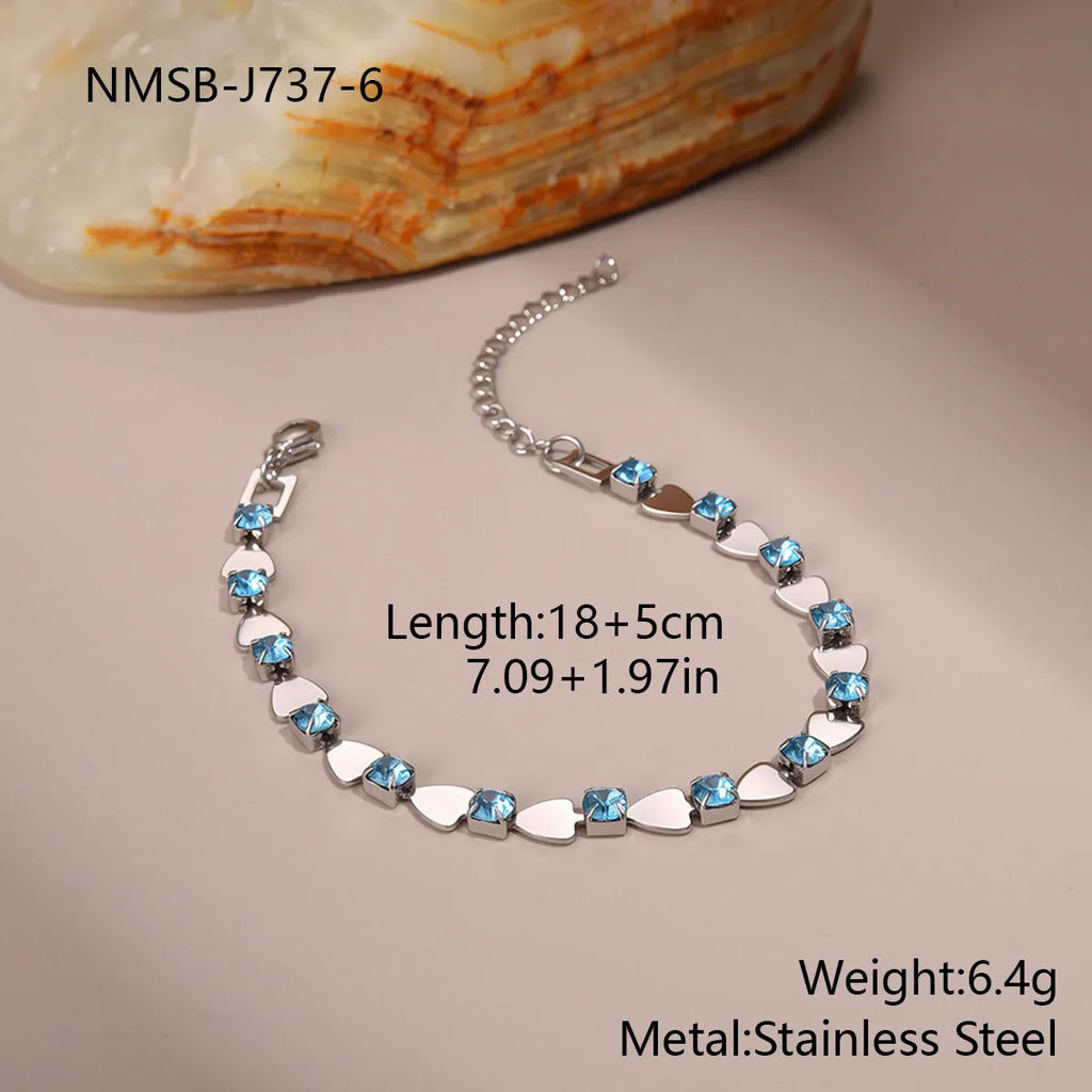 Temperamental women's stainless steel bracelet with 18K gold electroplating and geometric zircon accents in multiple colours