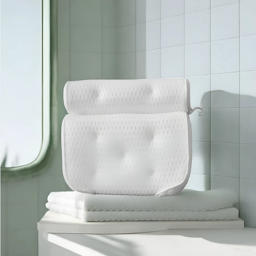 White bathtub pillow with suction cups on a 4D mesh cover.