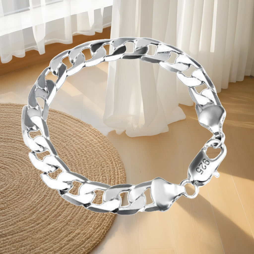 Silver-plated copper geometric bracelet on display, 22cm length, 10mm width, unisex style