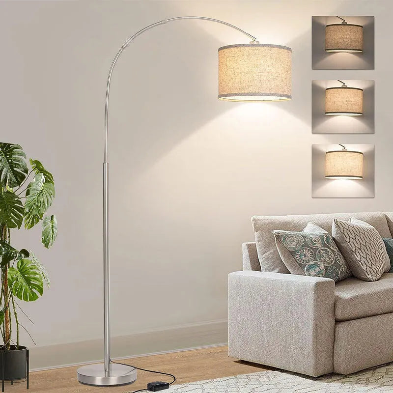 Modern minimalist fishing floor lamp with black fabric shade standing in a living room corner