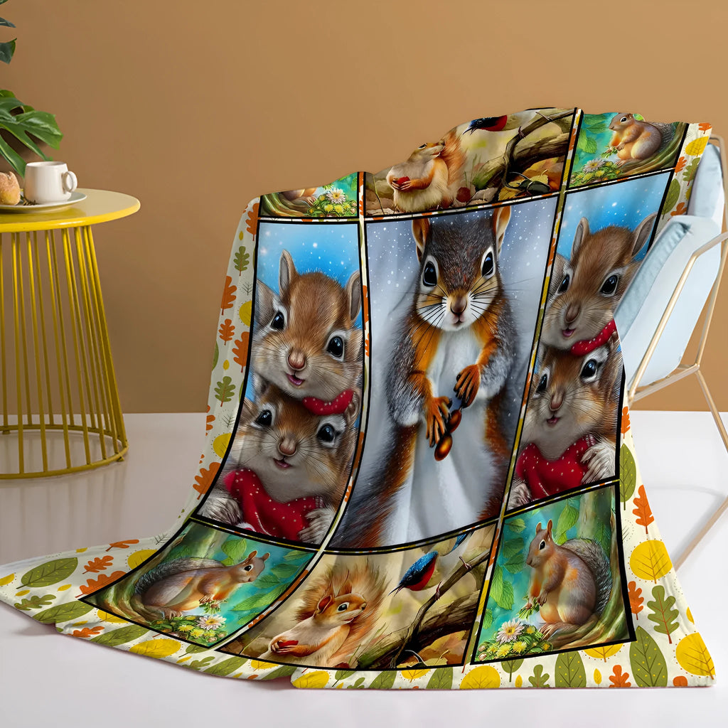 Yellow flannel blanket with white-bellied squirrel print, 130x150cm, folded on sofa
