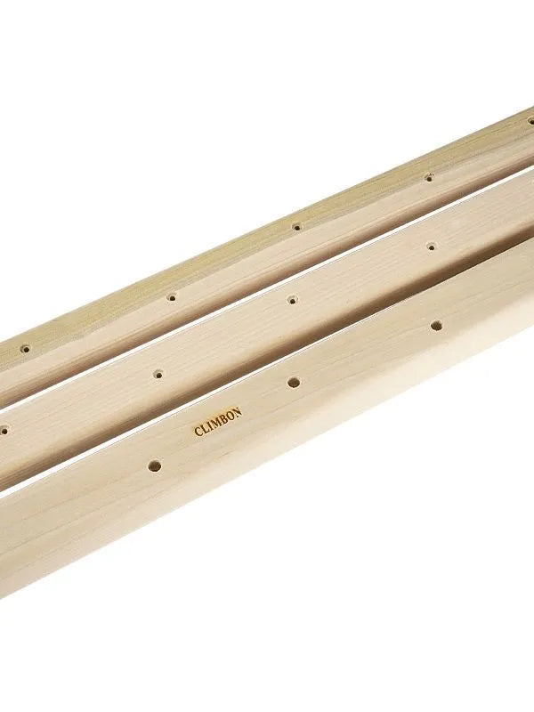 Set of three solid wood hangboards showing different lengths and ledge depths for grip strength training.
