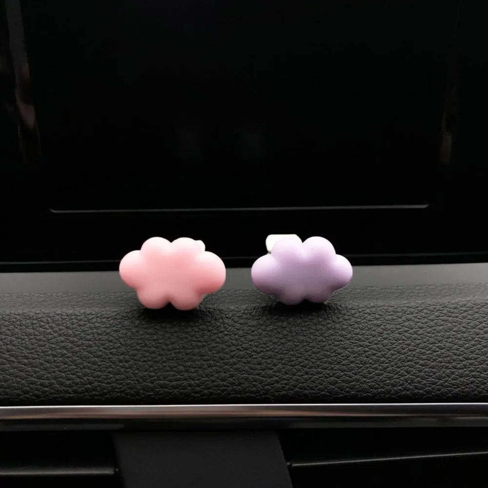 Cartoon Baiyun design resin car fragrance clip for air vents in assorted colours.